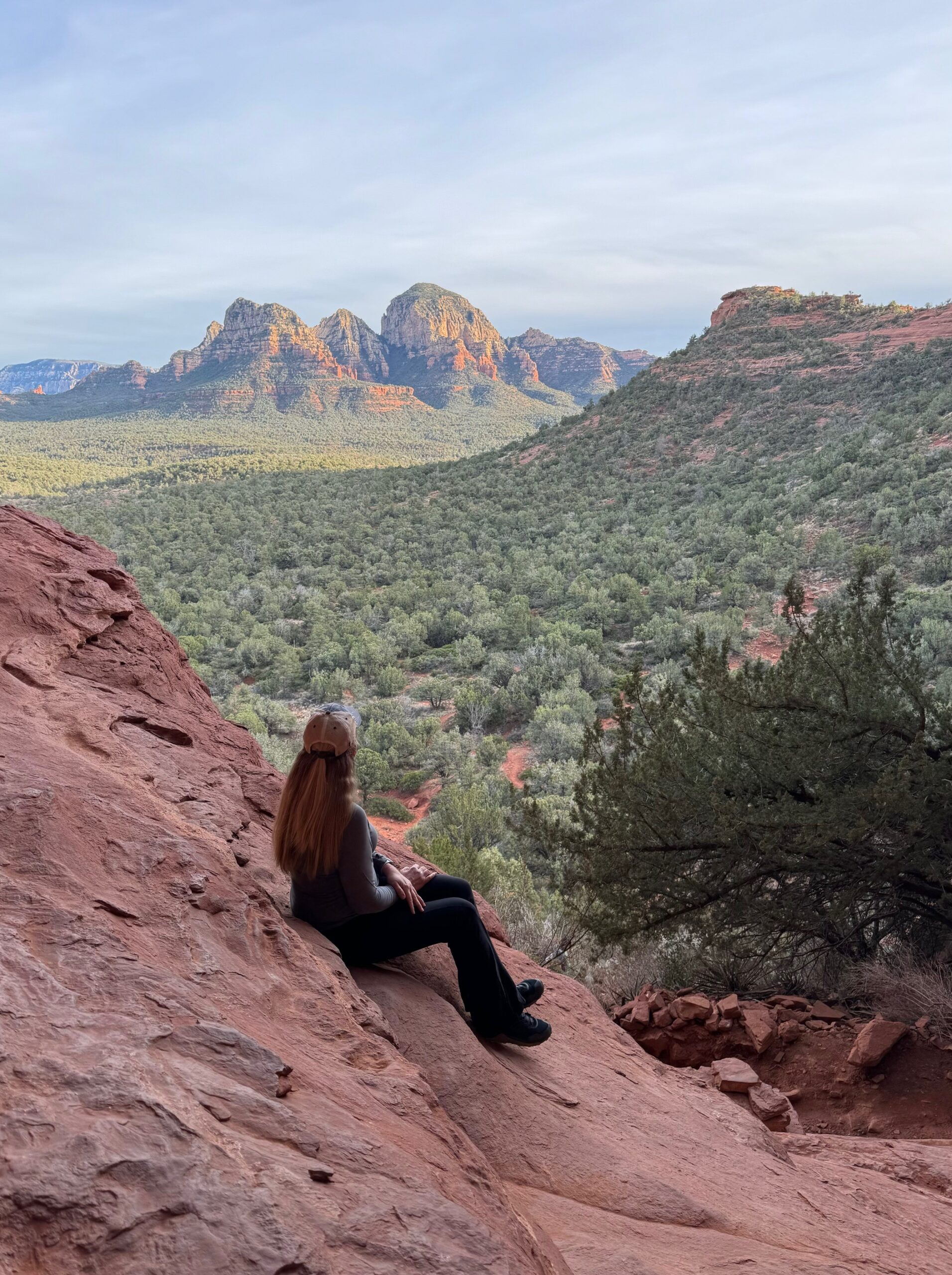 Woman contemplating on mountain
